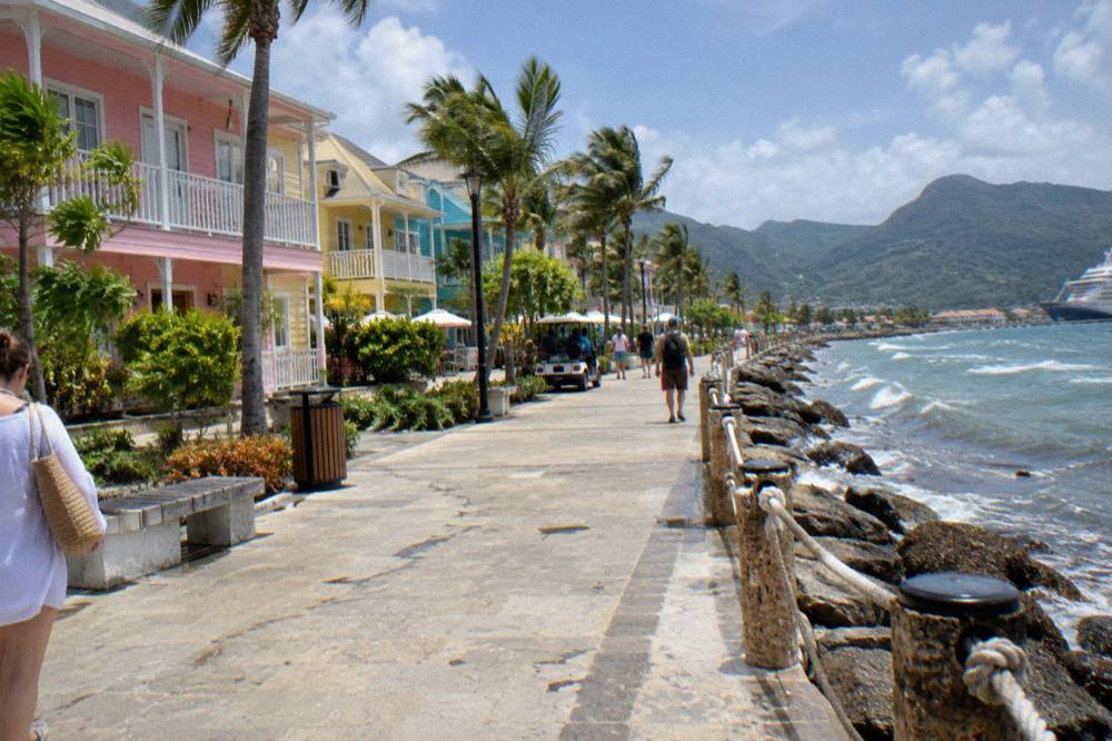 Colourful colonial buildings along a Caribbean waterfront promenade