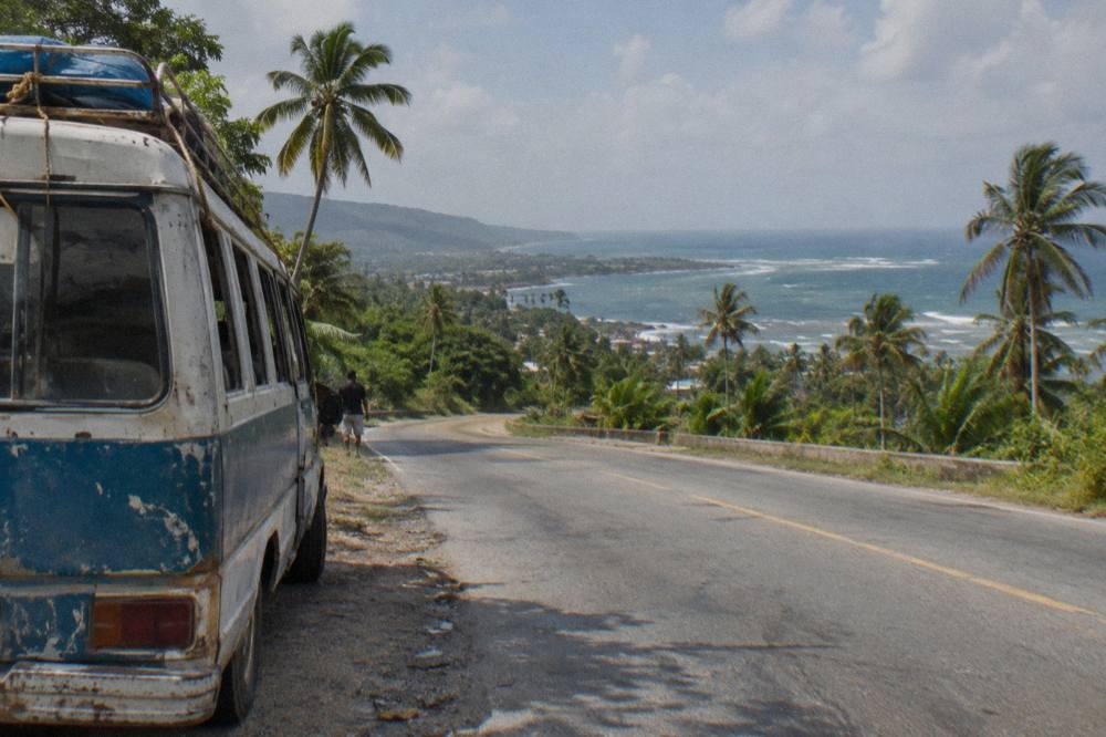 Highway crossing green hills on the drive toward Puerto Plata